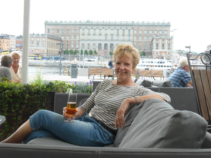 After riding our bike around all day it is time for that cold beer - the Royal Palace in the background (2)