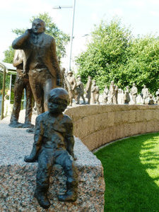 Bronze figures representing people from different periods in Oulu Finland (4)