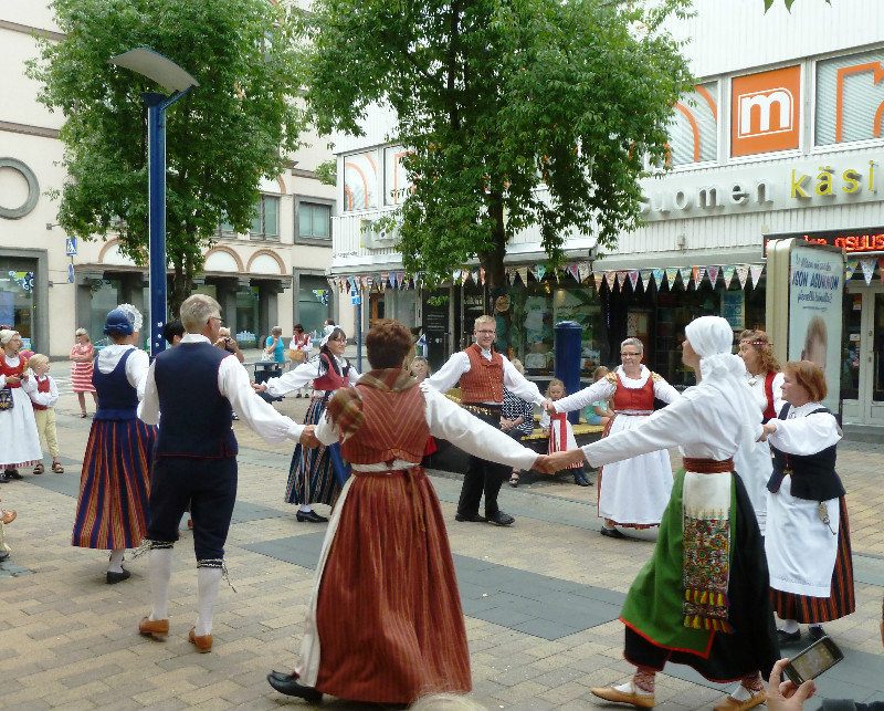 Traditional dance in mall of Jyvaskyla Finland - the community