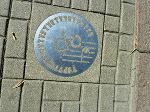 Silvery notes and plaques indicates the siteseeing paths around Liepaja Latvia - it is a very musical city (2)