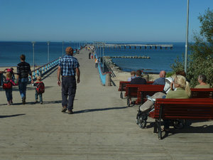 Seaside town of Palanga on west coast of Lithuania - see the bench seets lined up like a bus The people were just sitting there gazing out to sea