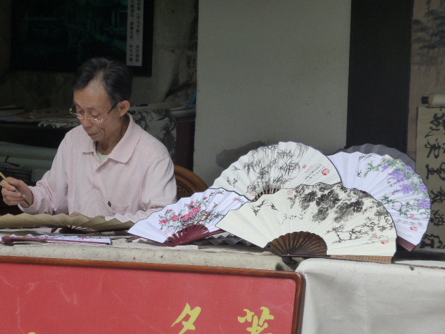 Fan artist at Jiaxiu Pavilion in Guiyang