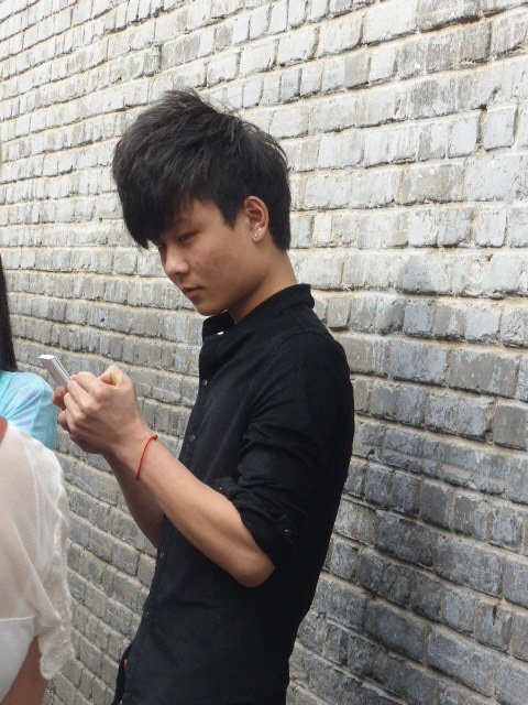 Hutong Tour in old Beijing - check out the hair style