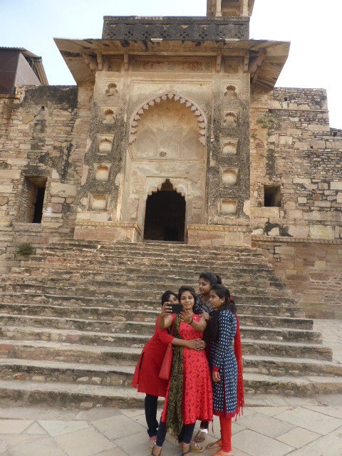 Young Indian girls taking facies at Gwalior Fort