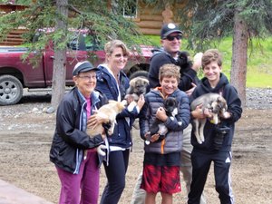 A family we traveled with visiting Husky Homestead