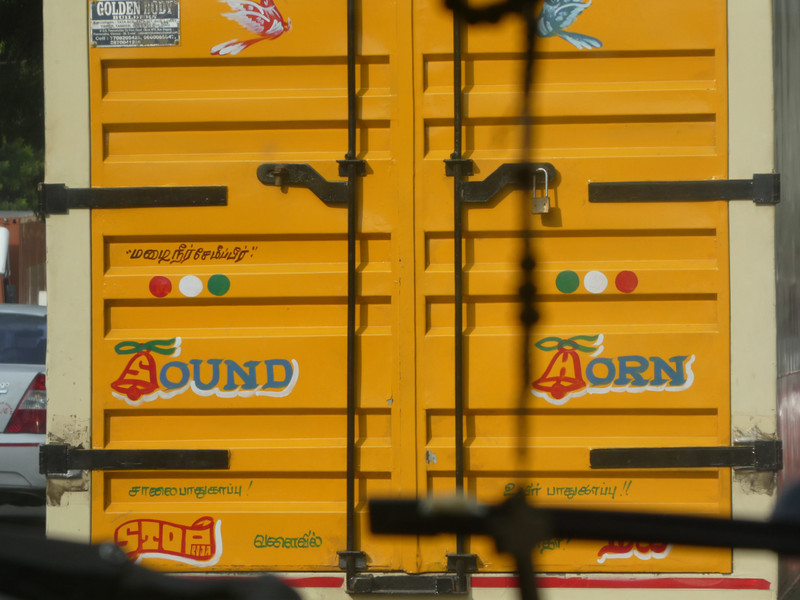Frenetic chaos in Chennai India - many trucks have this on the back - sound horn