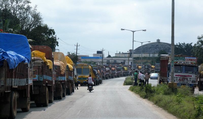 The road from Hussan to Mysore - rice trucks for rashions for people below poverty line - less than $300 pm