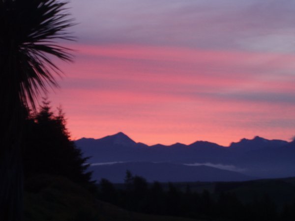 Sunset over the mountains in Te Anau