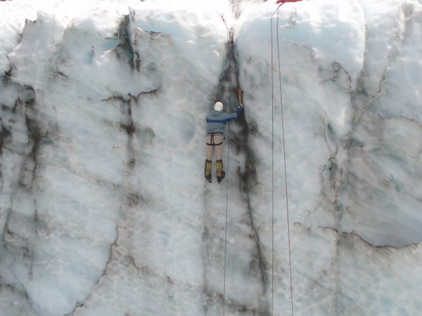 Some brave soul climbing the sheer ice face