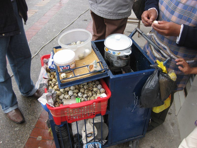 Street vendor selling freshly-boiled quail eggs