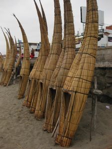Handmade reed "caballito" boats on the beach in Huanchaco