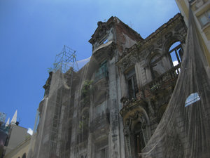 Shrouded skeleton of a building in Rio's rundown centre