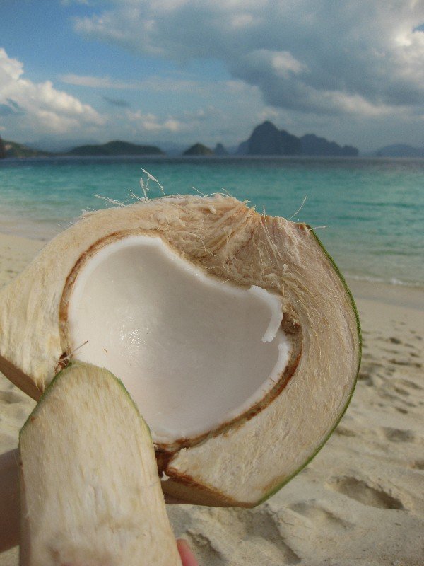 Snacking on young coconut