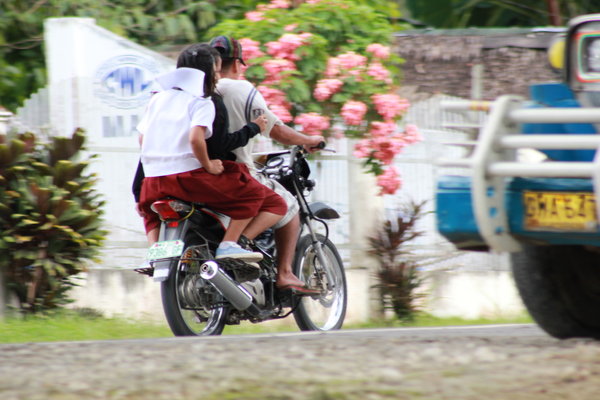 Motorcycle with 2 Passengers