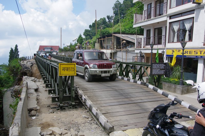 Temporary bridge to fix broken road