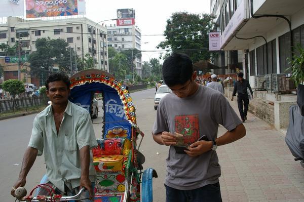 Paying for Rickshaw Ride