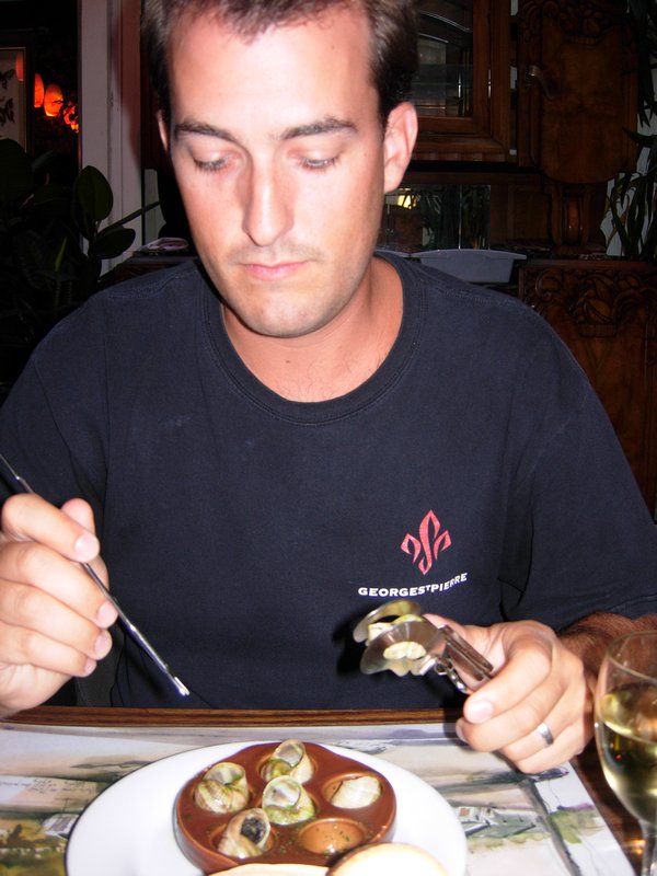 Rob eating Escargot