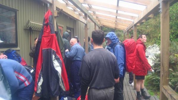 Trampers sheltering from the rain