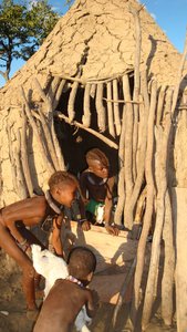Himba children at goat stable