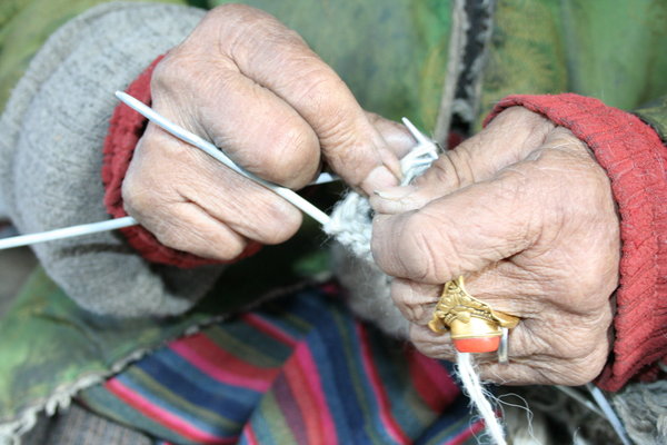 Old hands knitting