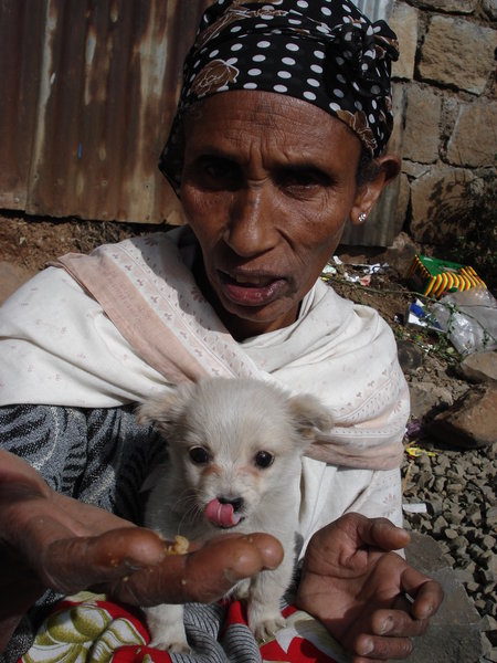 Woman with puppy in Addis
