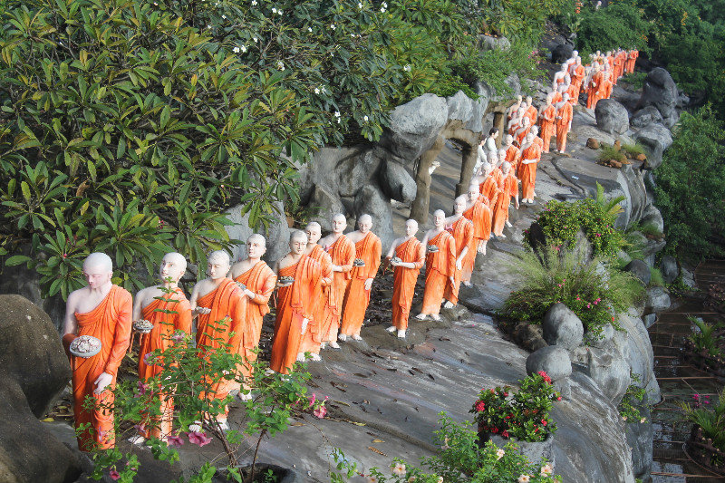 Statues of Buddhis monks at Golden Temple, Dambulla