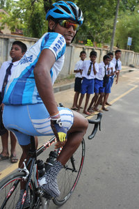 Cyclist and schoolgirls
