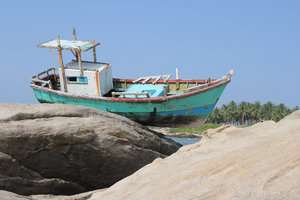 Boat on rocks by tsunami in Tangalla