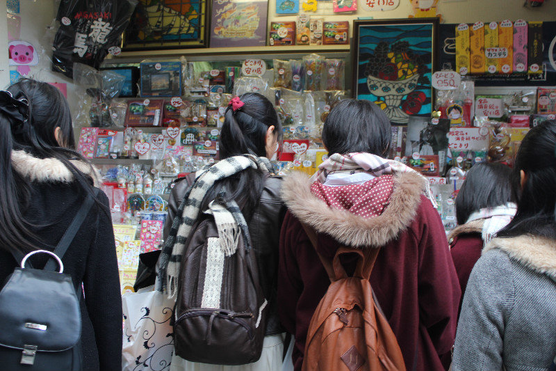School children gazing at souvenirs in Nagasaki