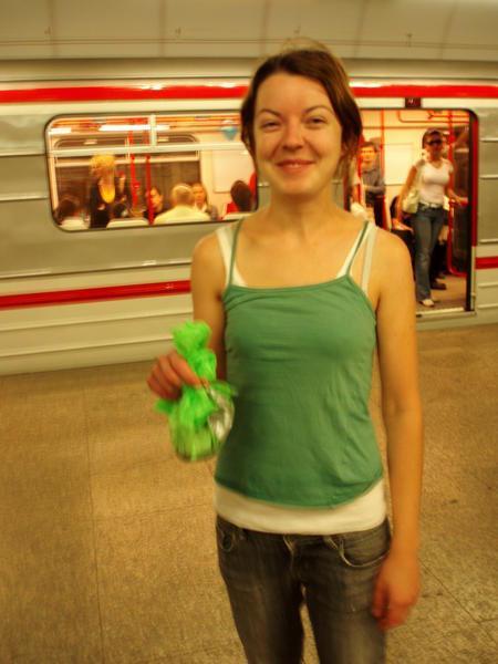 the result of our big night out - me the next morning proudly holding a bag of my own sick at the train station, prague