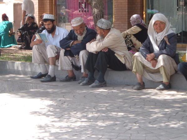 local men in traditional Islamic dress