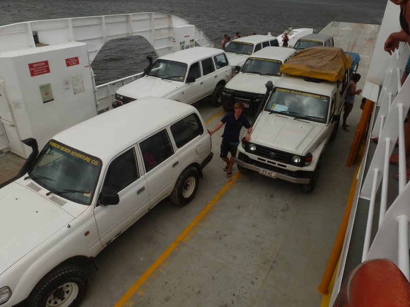 Fraser Island - The ferry ride over and out fleet of 4x4s