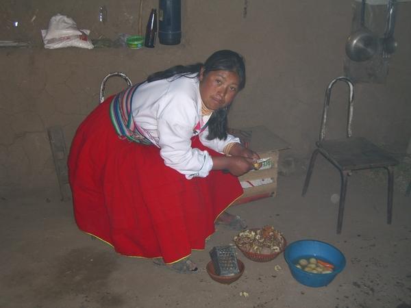 Our Amantani sister making lunch