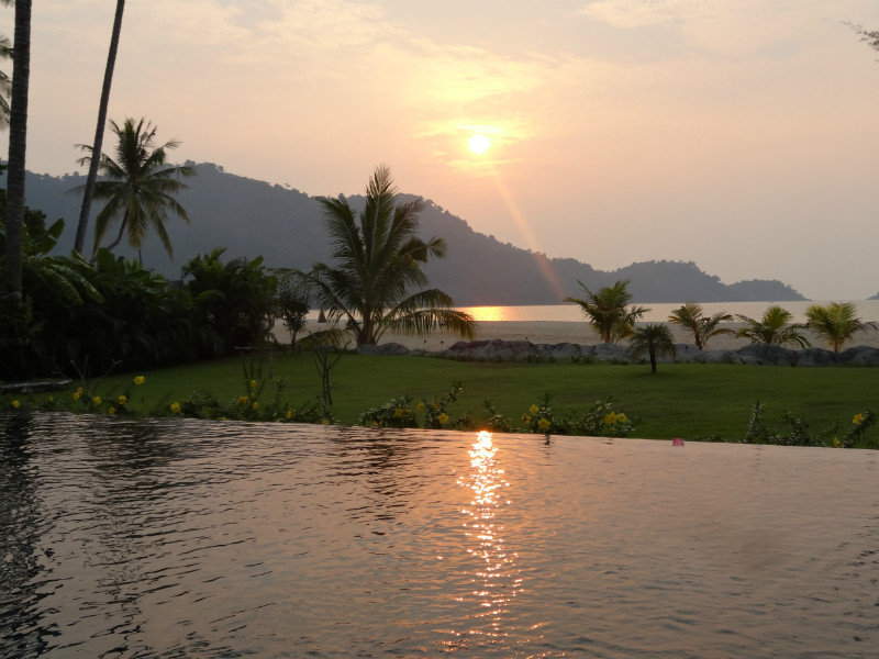 Sunset over our infinity pool