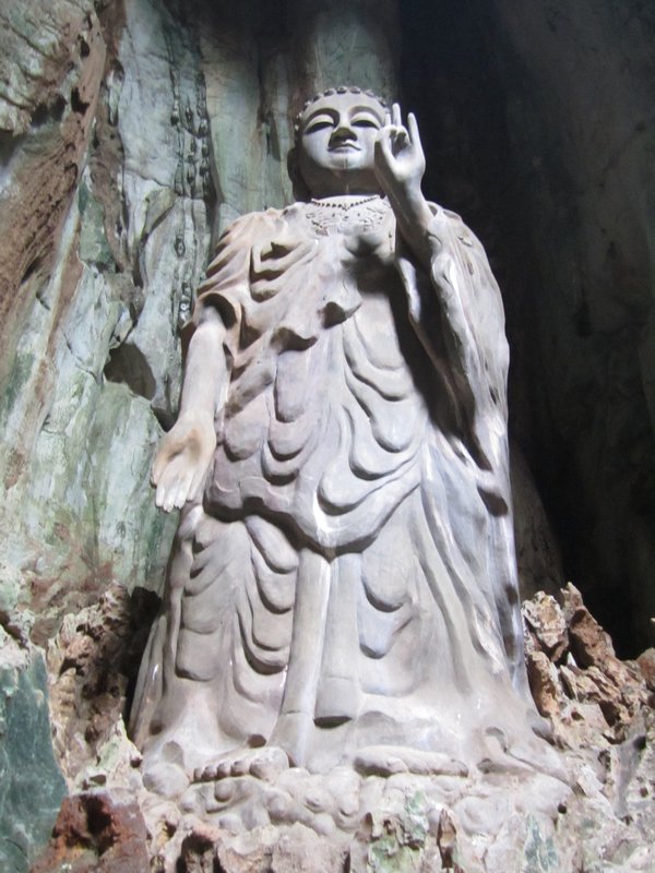 Buddha inside marble mountain