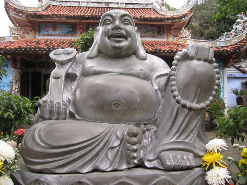 Happy Lucky Buddha on marble mountain