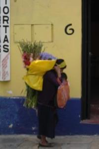 Woman carrying flowers
