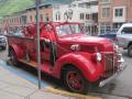 A classic fire truck just parked on the street!