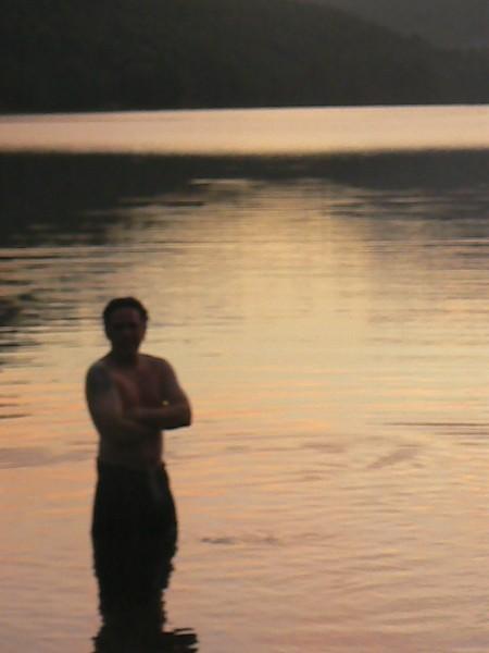 Jonathan at sunset at Camping Olga