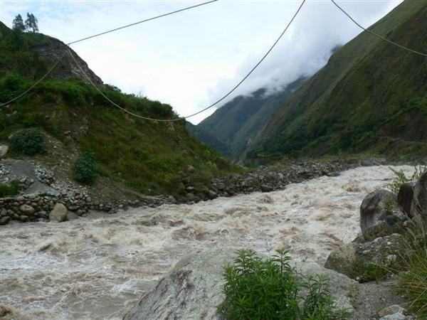 The raging river we crossed in baskets
