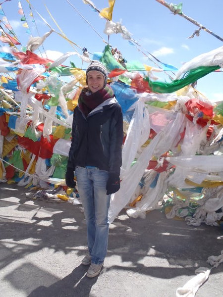 Me and prayer flags on the high pass.