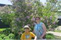 Paul and I infront of a Lilac tree.