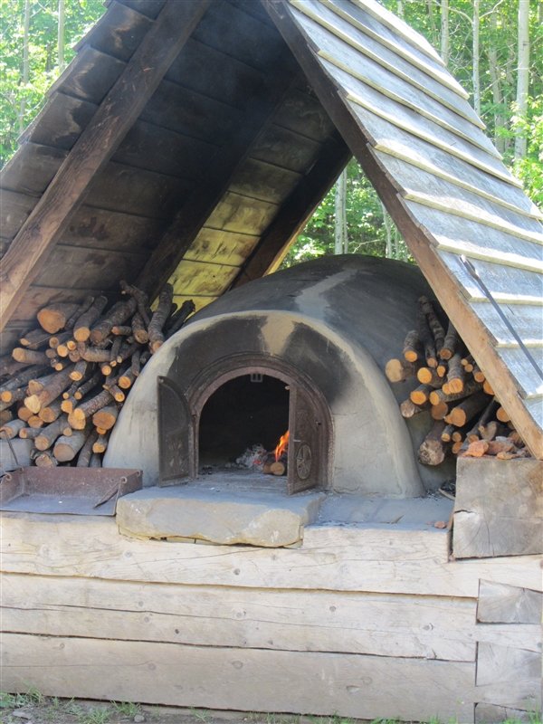 Firing up the stone bread oven