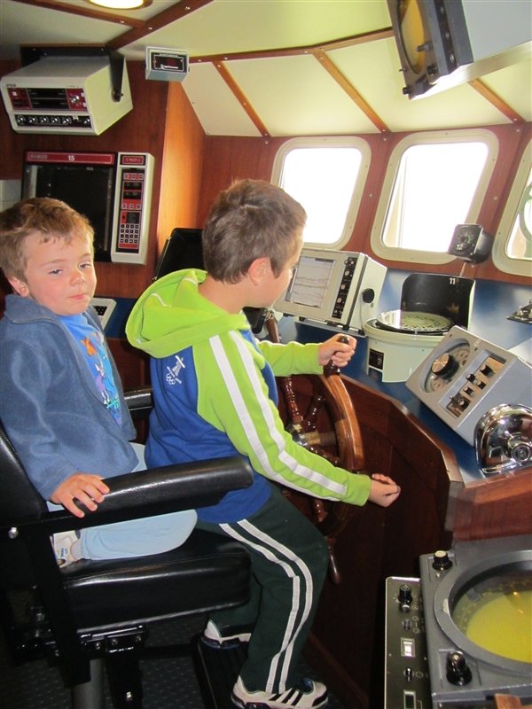 Pretending to be ship captains at the Aquarium and marine Center in Shippigan