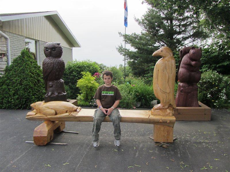 Paul with some of the large carvings at the Guay shop