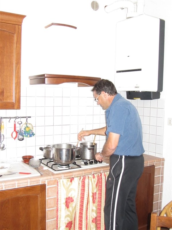 Claude cooking in our kitchen