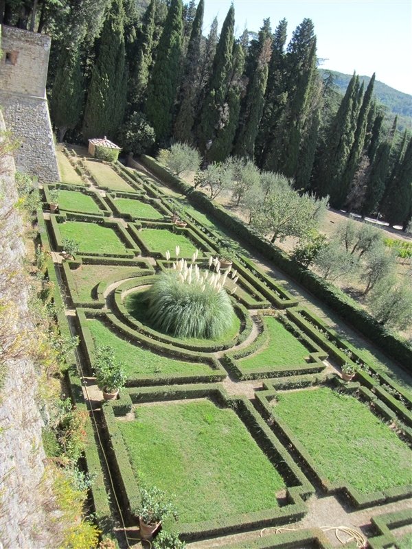 looking down at the formal gardens below the walls