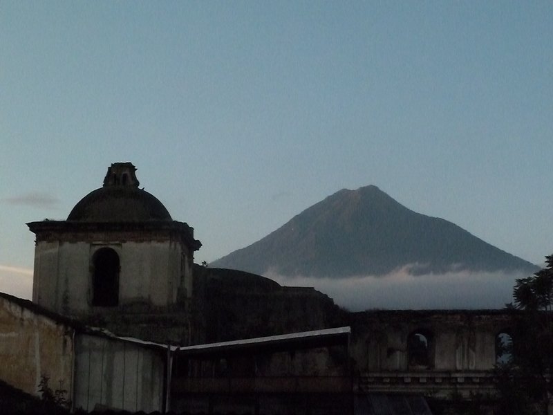 5am from our hotel balcony, an almost cloudless Volcano (rare!)