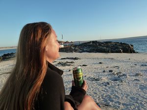 Donna enjoying a sunset beer