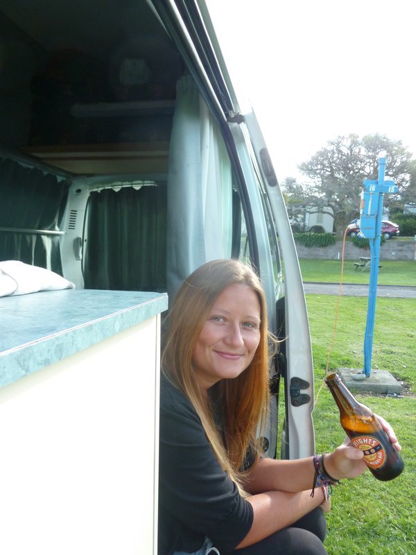 Donna enjoying a Speights in the van 